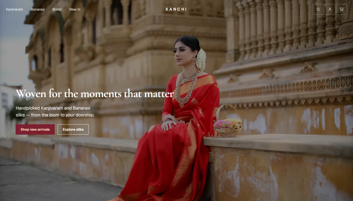 Kanchi template storefront: a saree house homepage with a full-width photograph